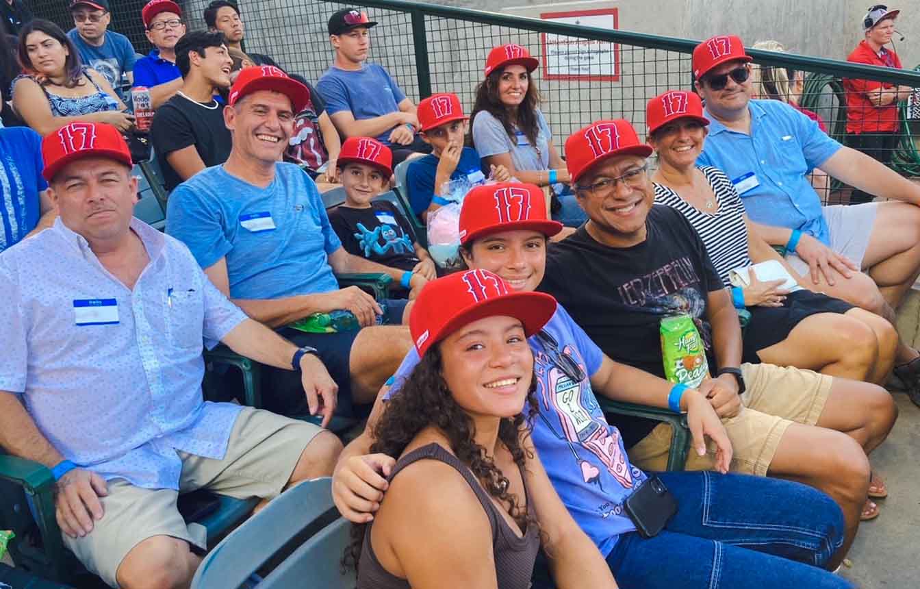 DGA team enjoying watching a baseball game