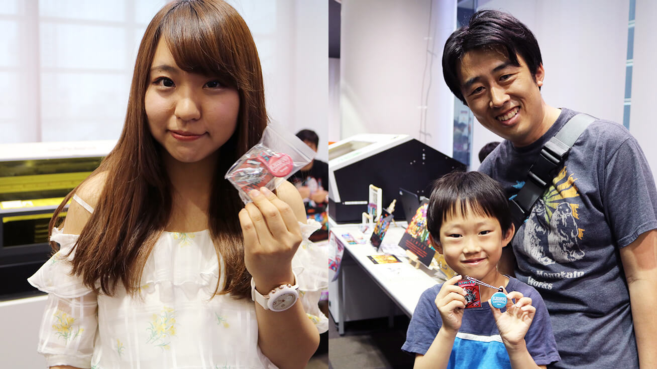 Visitors showing off their one-of-a-kind key chains.