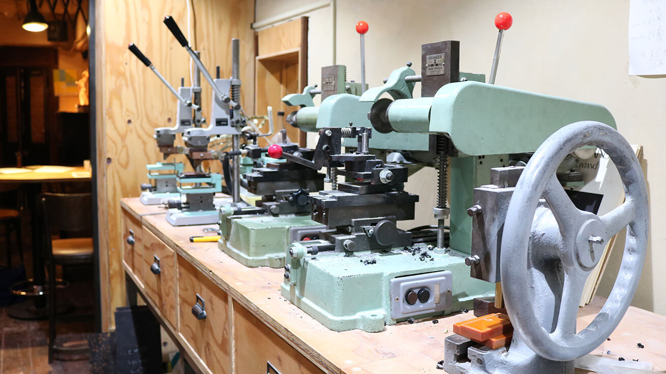 Various equipment used for fabricating frames lined up at the studio