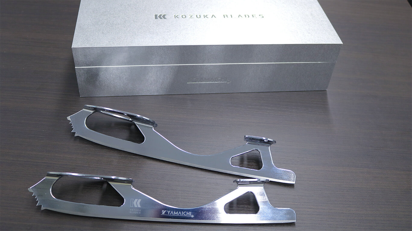 Completed blades (bottom) and their packaging that resembles a solid steel block (top).