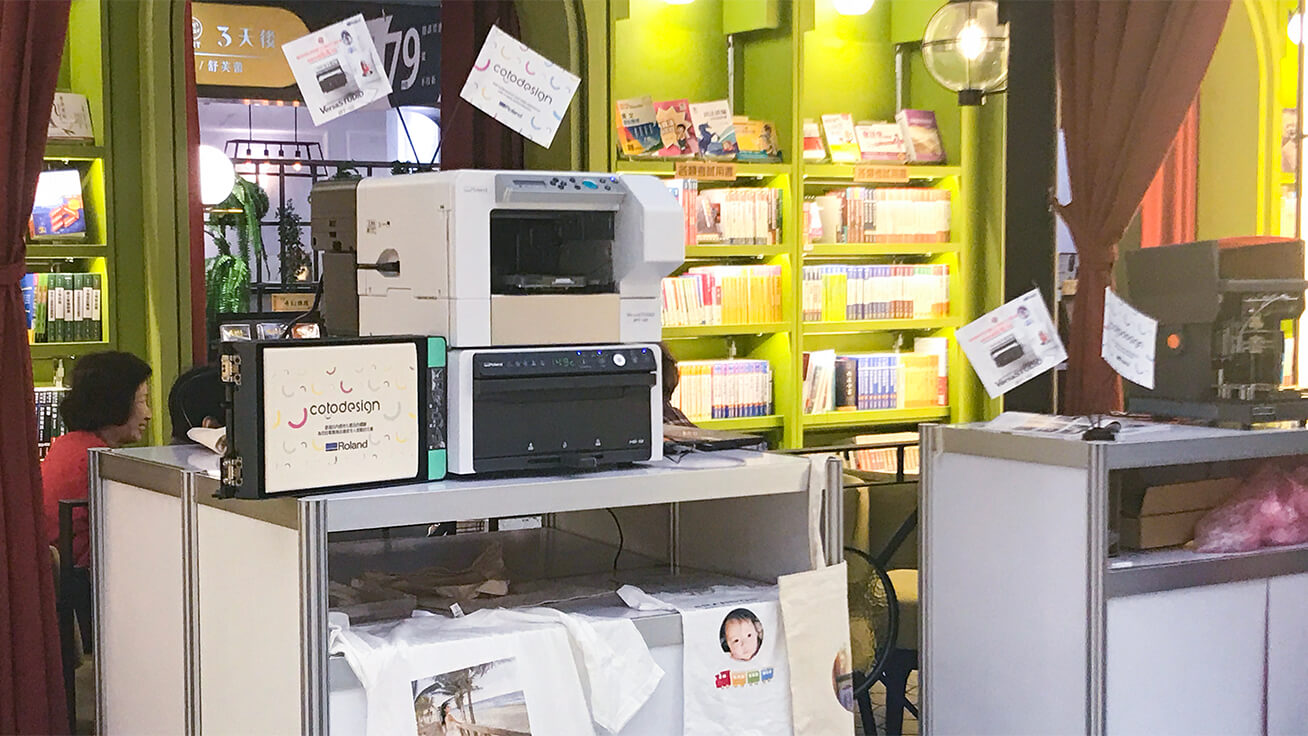 The BT-12 direct-to-garment printer (left), LD-80 laser foil decorator (right) and other digital tools that were used during the event.