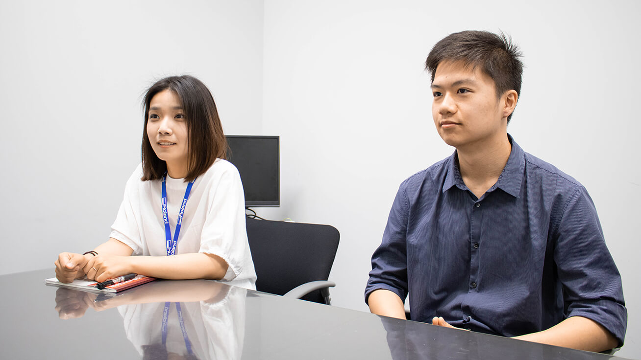 Jie Chen, left, graduated from the University of Michigan in the spring of this year while Darren Young is a third-year student at the University of Michigan.