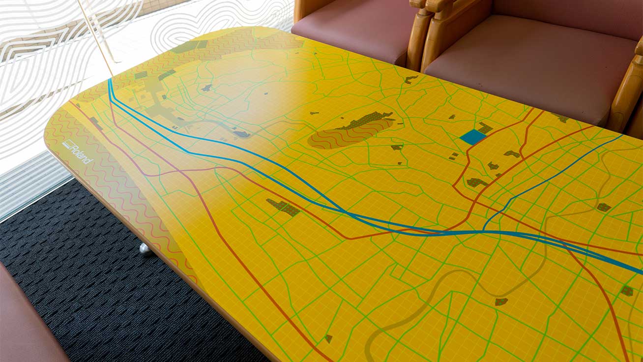 Table wraps feature a map of the area around the campus printed in brilliant colors using a VG2-540.