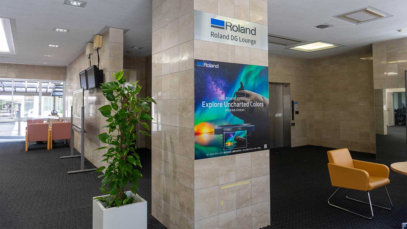 Signboards showcase Roland DG products and technology.