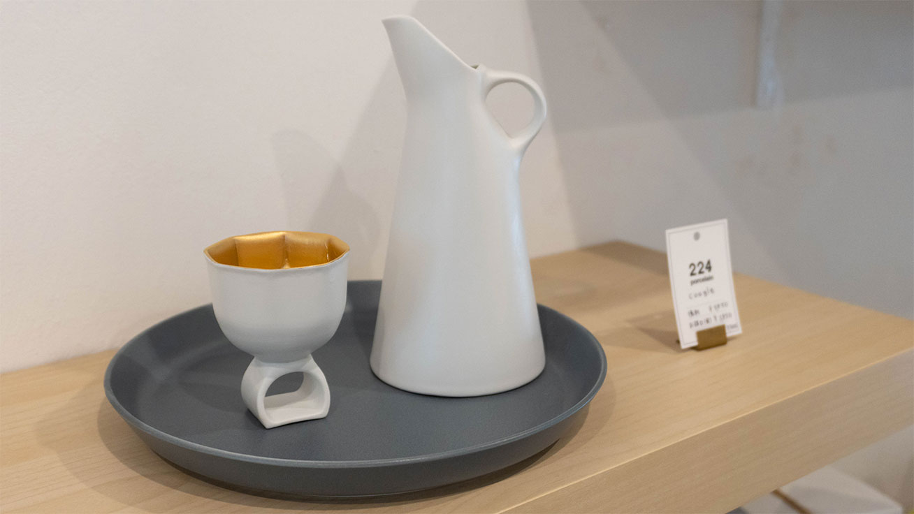 Unique sake serving set designed to slide over your finger like a ring
