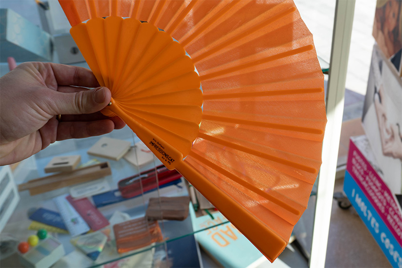 A custom-printed folding fan