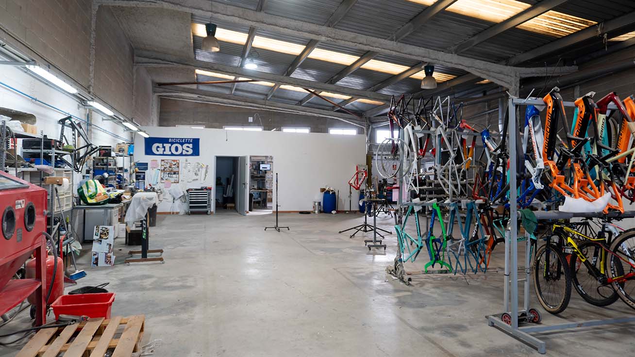 SColors’ spacious workshop where they create custom bikes with precision.