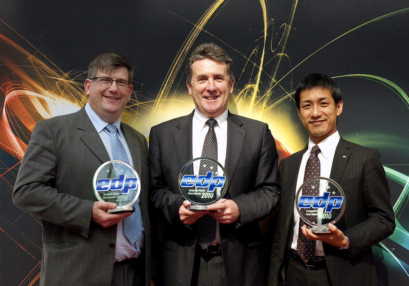 At the Award Ceremony: (from left to right) Brett Newman, Director of Roland DG UK, Jerry Davis, Managing Director of Roland DG UK,  and Kohei Tanabe, Manager of Roland DG Corporation.