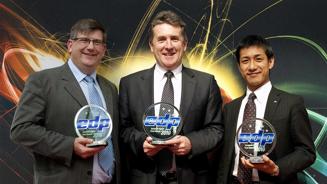 At the Award Ceremony: (from left to right) Brett Newman, Director of Roland DG UK, Jerry Davis, Managing Director of Roland DG UK,  and Kohei Tanabe, Manager of Roland DG Corporation.